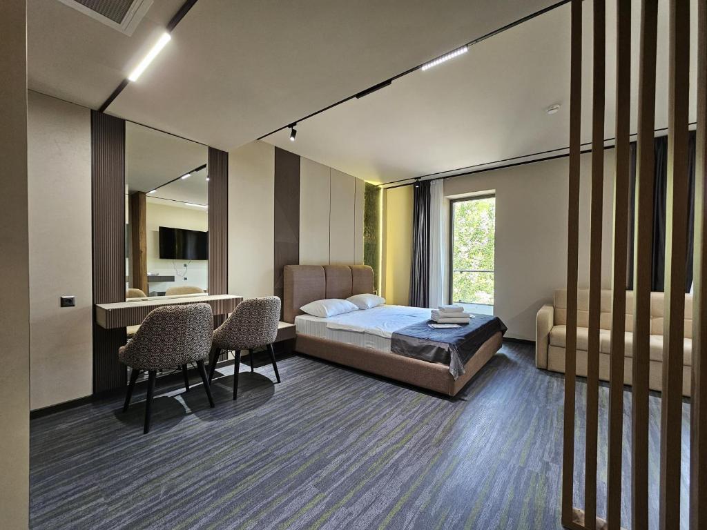 ისარგებლე ფასდაკლებით ორადგილიან ნომერში განთავსებაზე, საუზმით წყალტუბო ეპიკ სასტუმრო და სპა | Tskaltubo Epic Hotel & Spa -ში. image 1