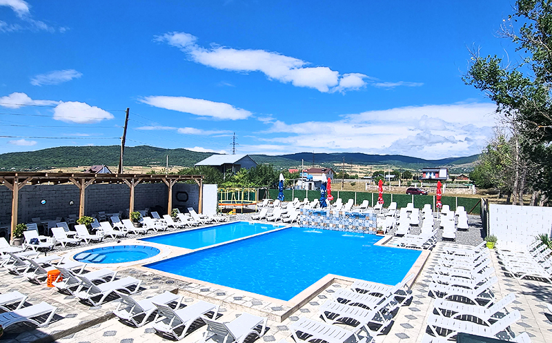 Enjoy sunny days at Laguna Bazaleti's open swimming pool. 2