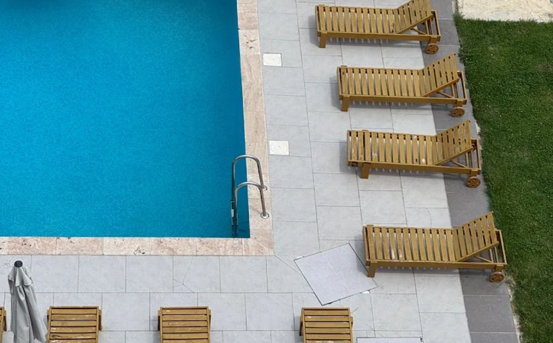 Spend your sunny days at the outdoor swimming pool in the Kingdom. 3