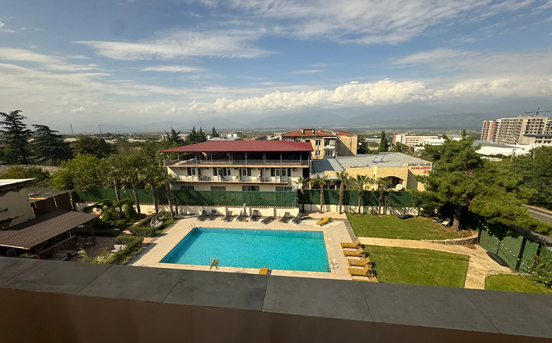 Spend your sunny days at the outdoor swimming pool in the Kingdom. 5
