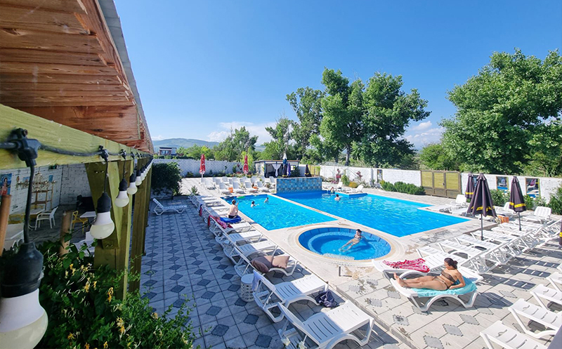 Enjoy sunny days at Laguna Bazaleti's open swimming pool. 3