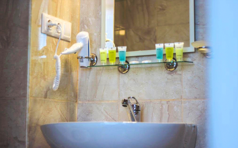 Take advantage of the discount on a two-guest stay at the Green Glass Hotel. image 10