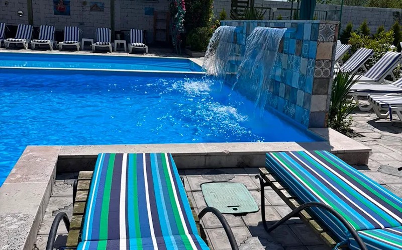 Enjoy sunny days at Laguna Bazaleti's open swimming pool. 11