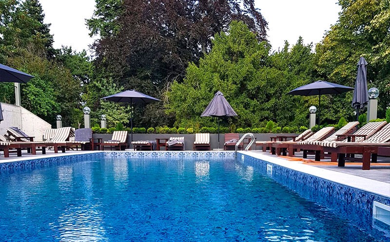 Enjoy sunny days at the Residence's outdoor swimming pool. 0