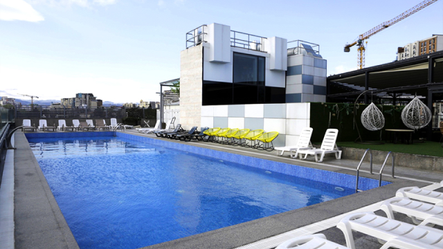 Take advantage of a discount on a one-time visit to the outdoor swimming pool at Sky Gate. image 1