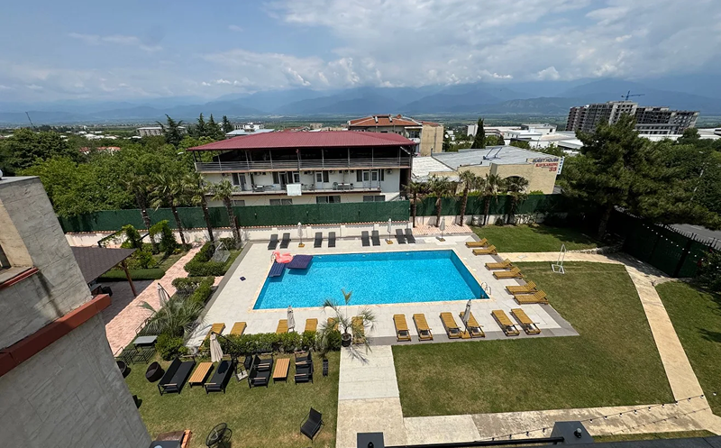 Spend your sunny days at the outdoor swimming pool in the Kingdom. 2