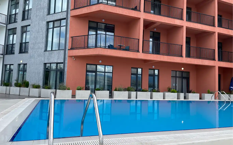 Enjoy sunny days at Gino Seaside's pool. 5
