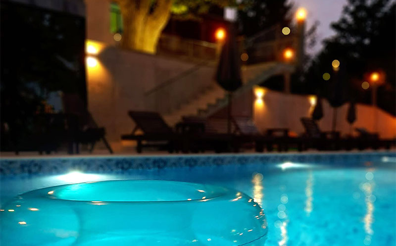 Enjoy sunny days at the Residence's outdoor swimming pool. 3