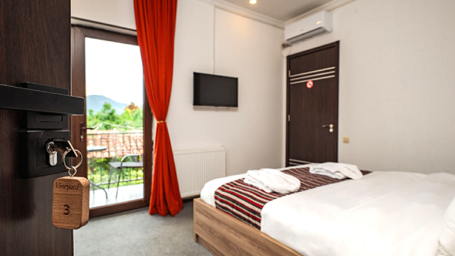 Enjoy a discount on hotel rooms for 2, 3, and 4 guests at Vineyard Hotel & Winery. image 25