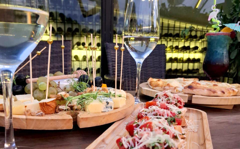 Share the Flavors: Salad, Khachapuri, Mtsvadi, and Saperavi Wine for Two at Rezidenko image 6