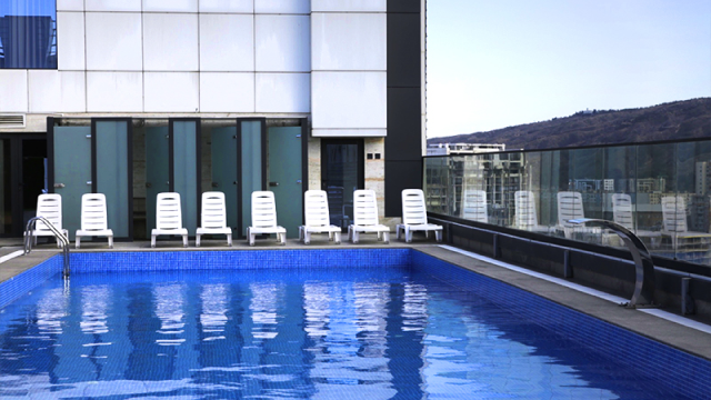 Take advantage of a discount on a one-time visit to the outdoor swimming pool at Sky Gate. image 2