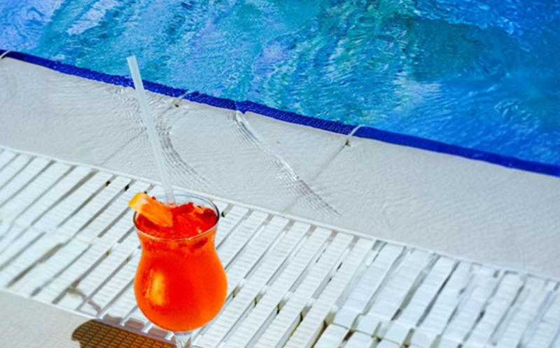 Enjoy sunny days at Gino Seaside's pool. 6