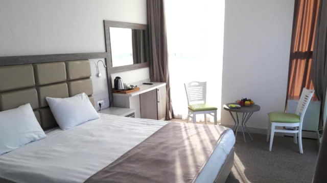 Take advantage of the discount on a two-guest stay at the Green Glass Hotel. image 6