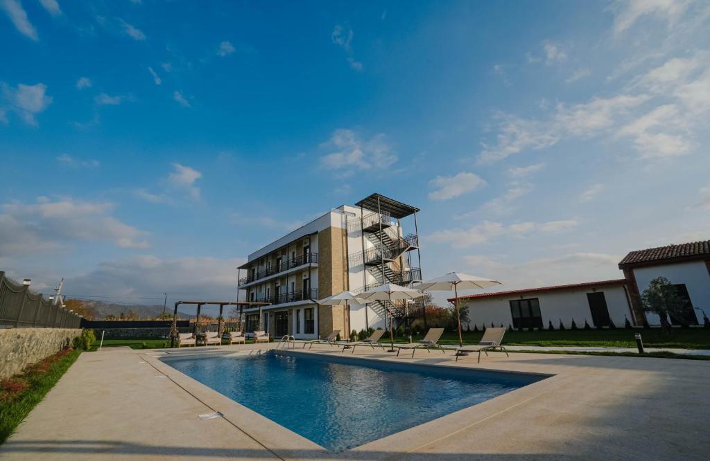 One-time visit to the outdoor swimming pool at Mikheili’s Marani Boutique Hotel 6