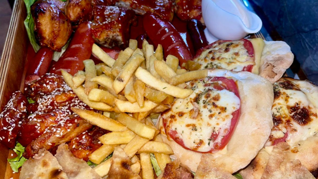 As part of this offer, get an XXL Ribs Platter for 6 guests at Dallas Pub.  image 1