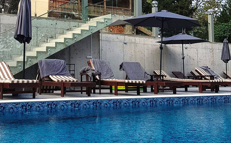 Enjoy sunny days at the Residence's outdoor swimming pool. 2