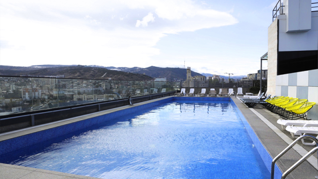 Take advantage of a discount on a one-time visit to the outdoor swimming pool at Sky Gate. image 0